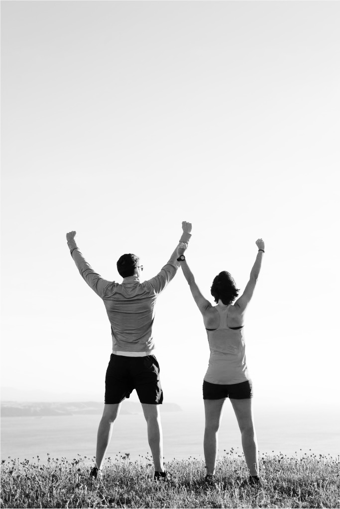 sporty runner-couple-rising-arms-in-victory-sign-outdoor-picture-id597953156%20copy